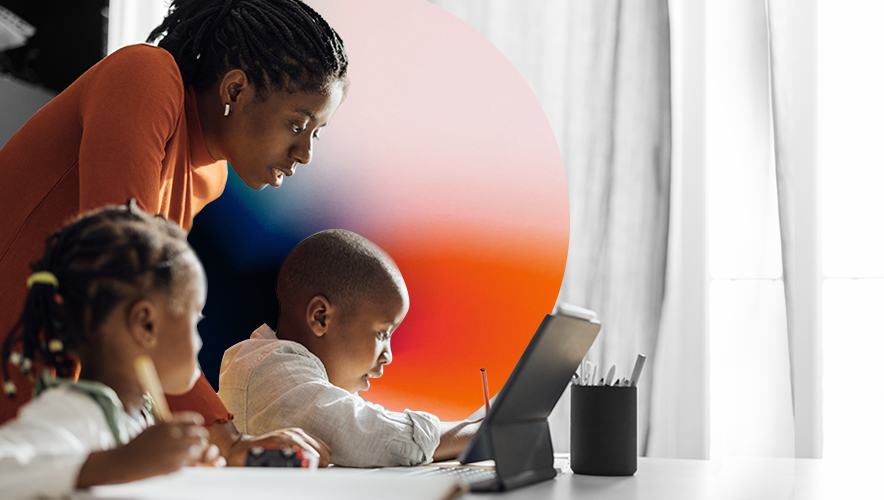 mom watching over her children complete homework on laptops