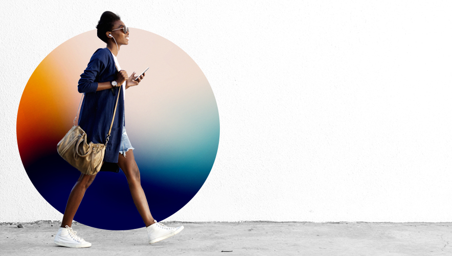 women walking with cell phone