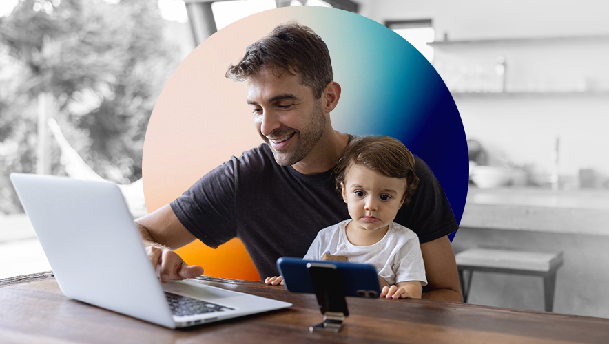 Man on desktop and small boy watching movie on mobile phone